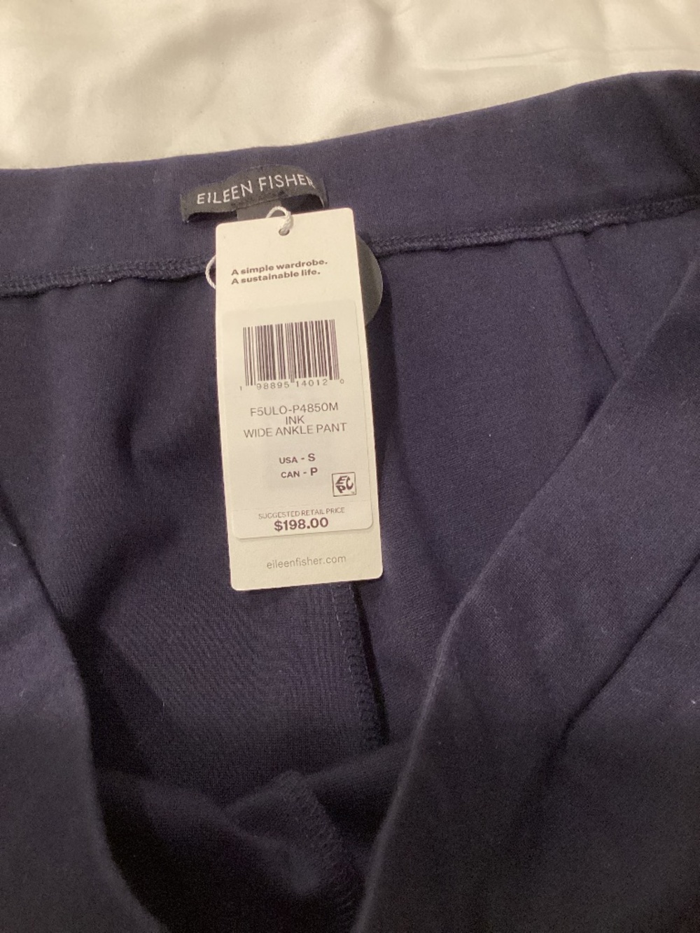 Eileen Fisher wide ankle pants in navy.